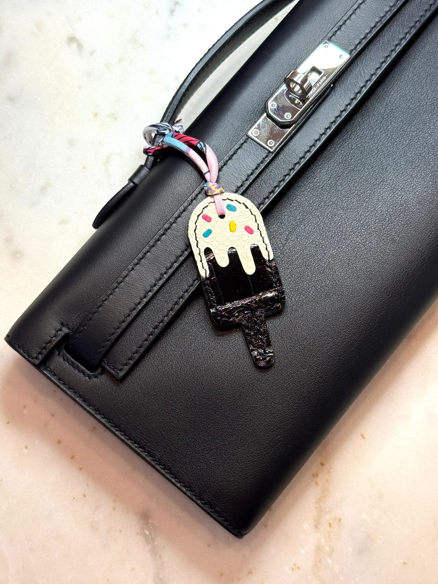 Popsicles shinny black crocodile and white lizard